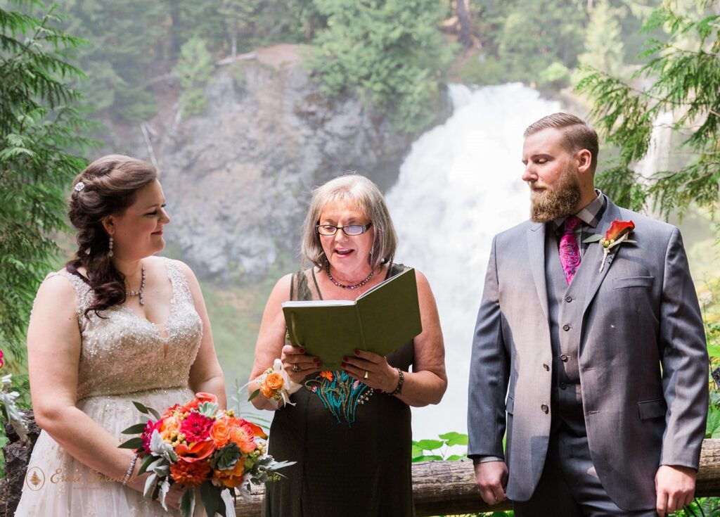An Oregon officiant marries a couple at Sahalie Falls. 