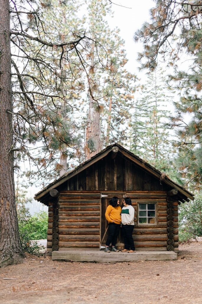 A couple embraces at a cabin near a lake in Sisters, Oregon. 
