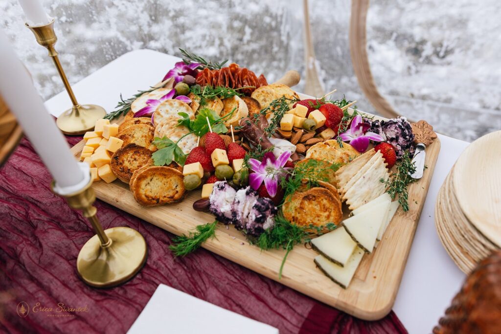 elopement picnic charcuterie set up on a boho styled table setting