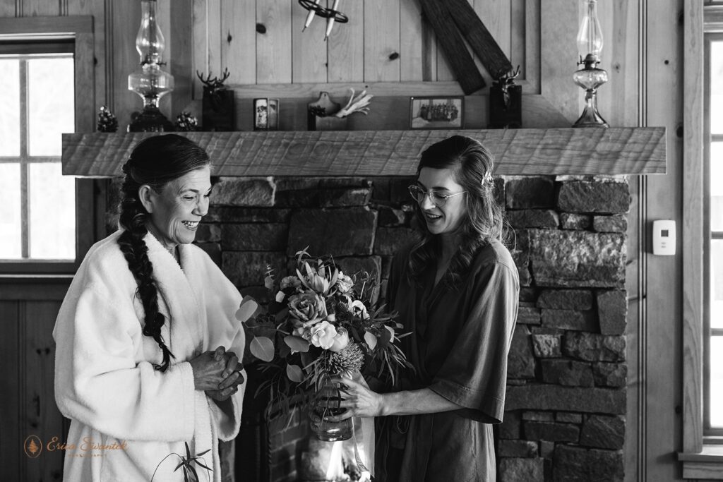 mom delivering a colorful bridal bouquet to her daughter, the bride