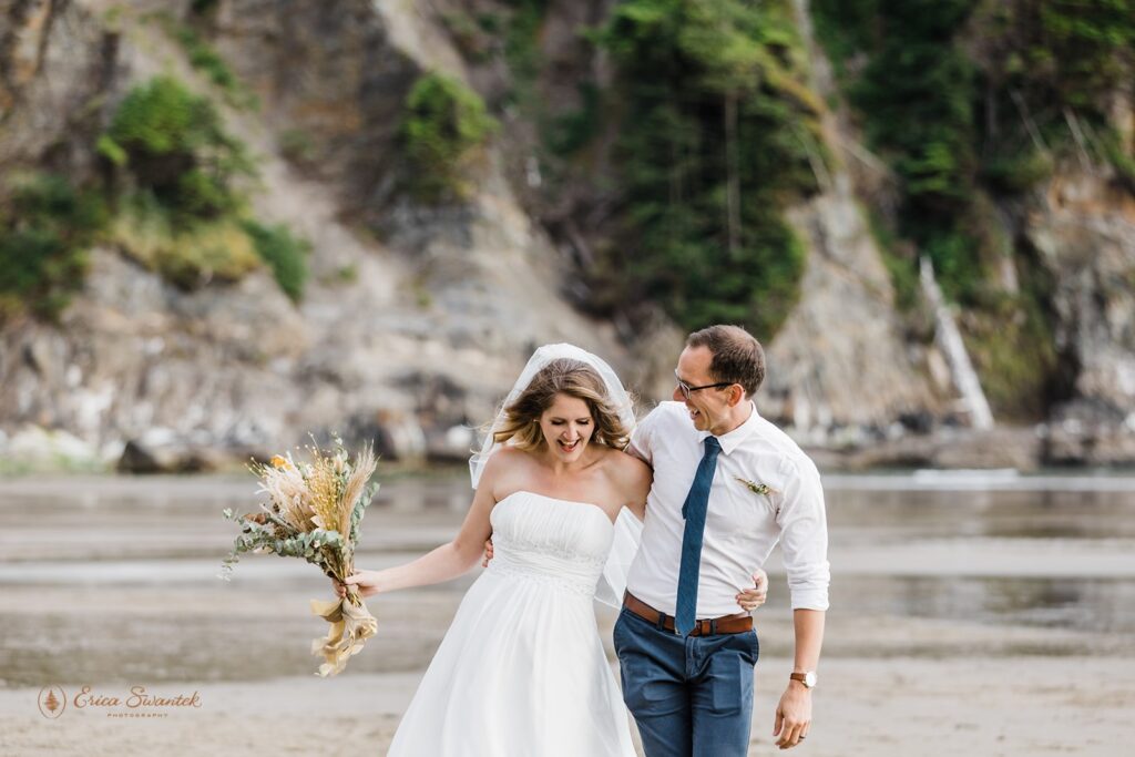 playful elopement couple at the oregon beach