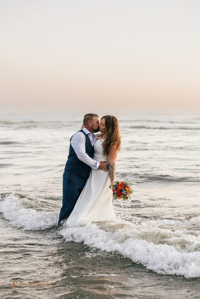 playful elopement couple during their beach elopement in Oregon