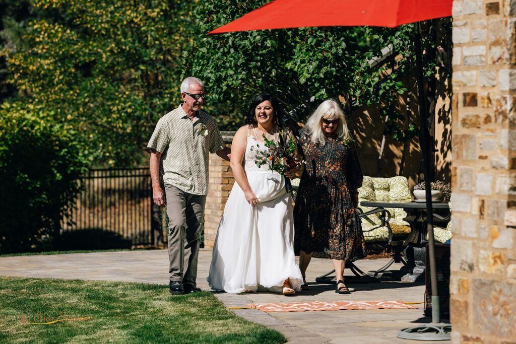 walking down the aisle with mom and dad