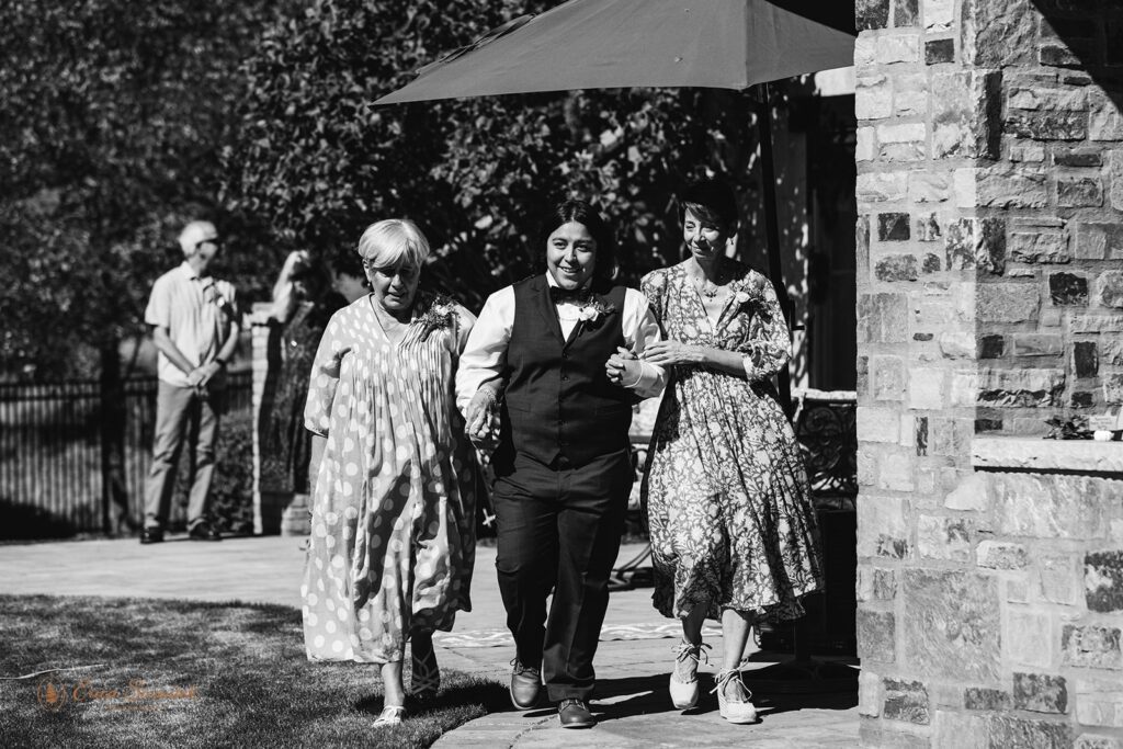 walking down the aisle with mom and grandma