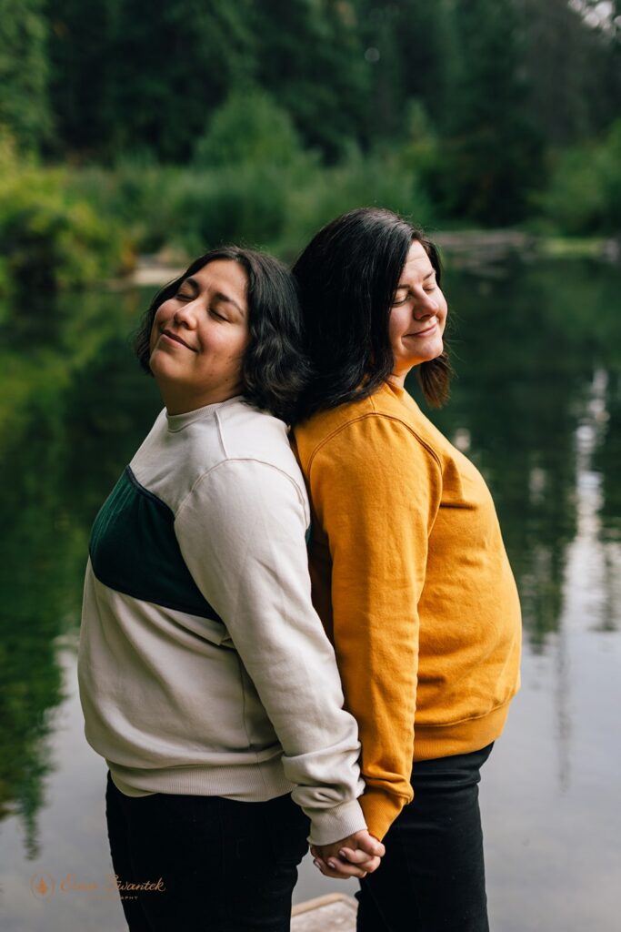 lgbtq couple having a blast during their pre wedding session at suttle lake lodge