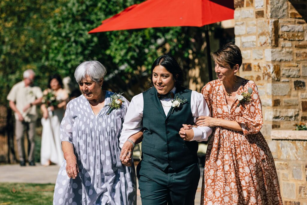 walking down the aisle with mom and grandma