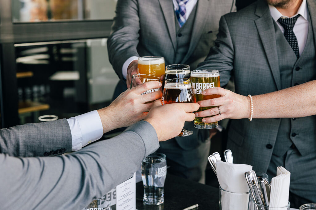 A bride and groom celebrates their elopement with a mid day beer break at a local Bend Oregon brewery.