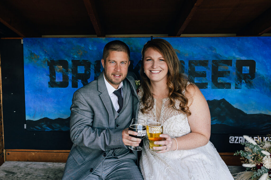 A bride and groom celebrates their elopement with a mid day beer break at a local Bend Oregon brewery.
