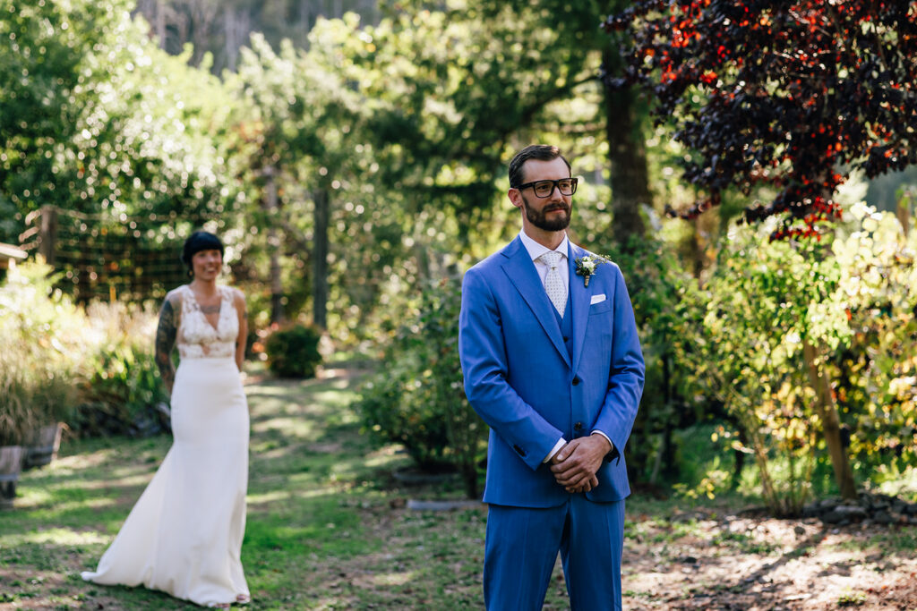 A first look between a couple outside their cabins at their brookings, oregon elopement.