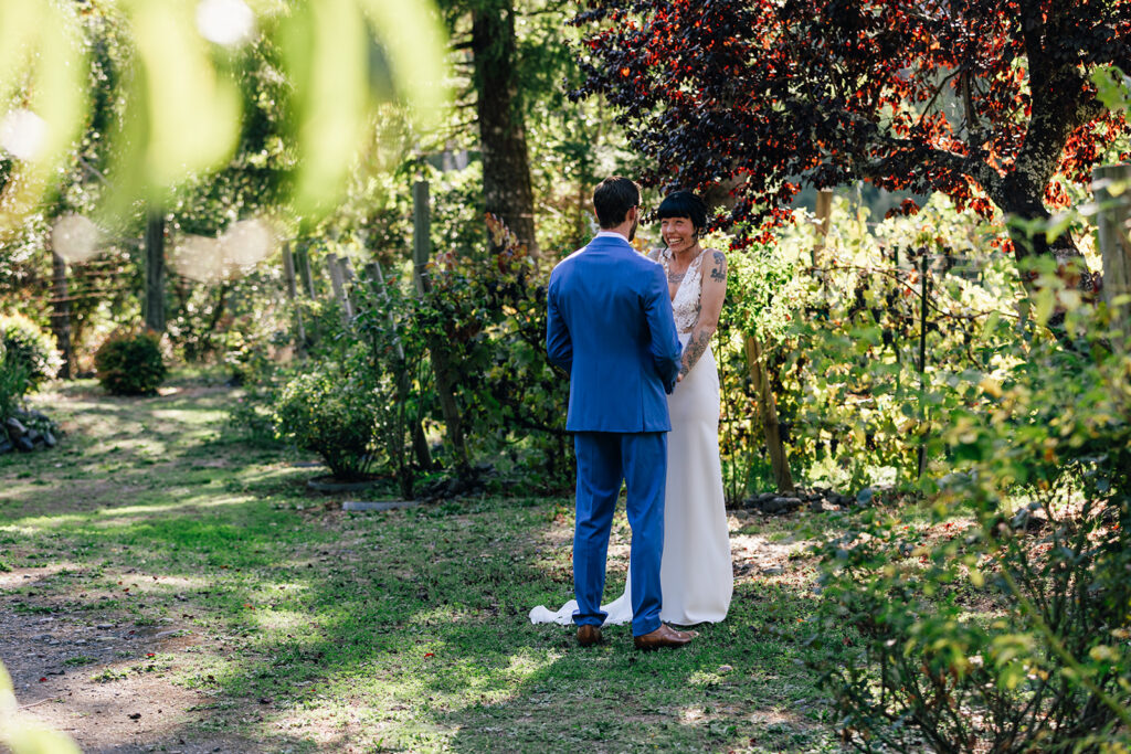 A first look between a couple outside their cabins at their brookings, oregon elopement.
