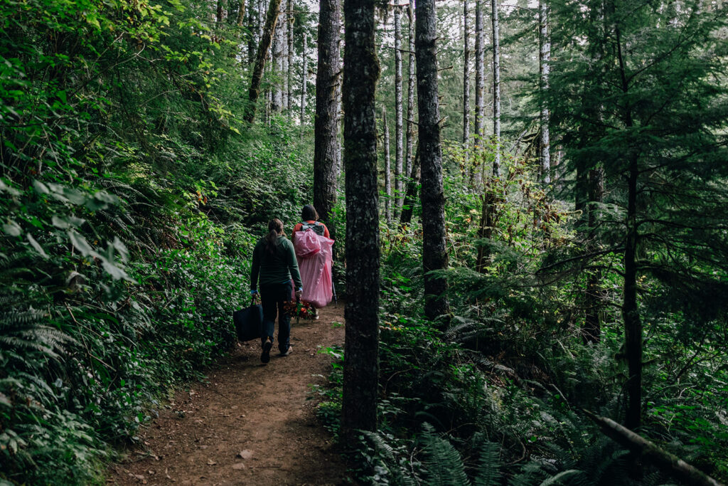 A couple hikes to first look location for their Oregon waterfall elopement.
