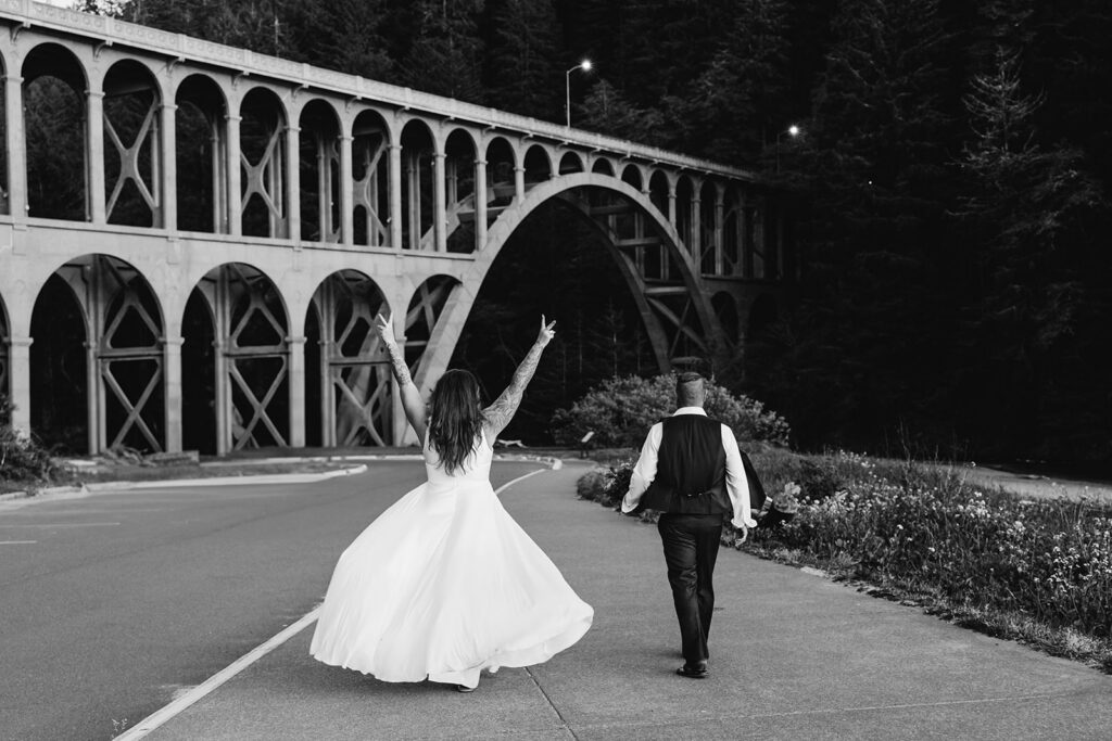 A couple elopes at Cape Cove Beach near Heceta Lighthouse on the Oregon Coast.