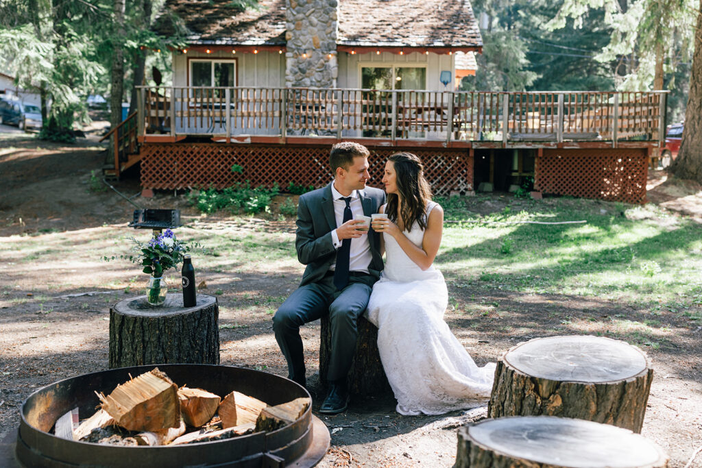 A bride and groom share a coffee break during their full day elopement in Washington. 