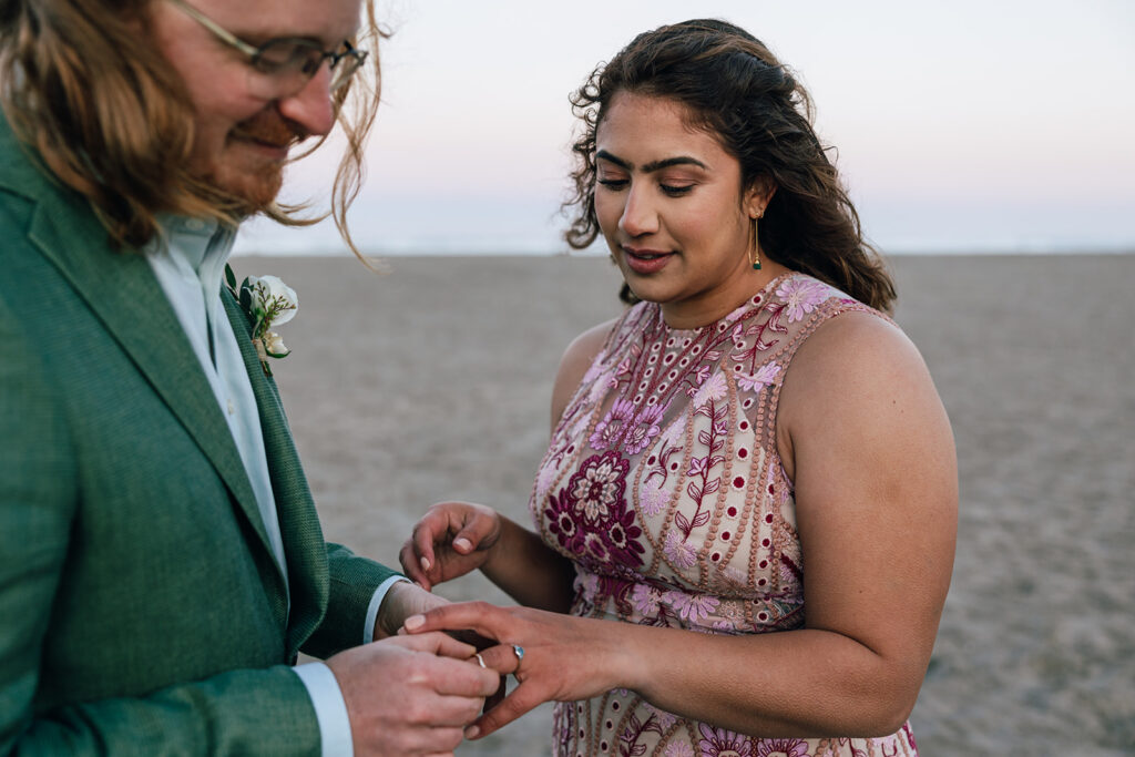 bride and groom exchange rings