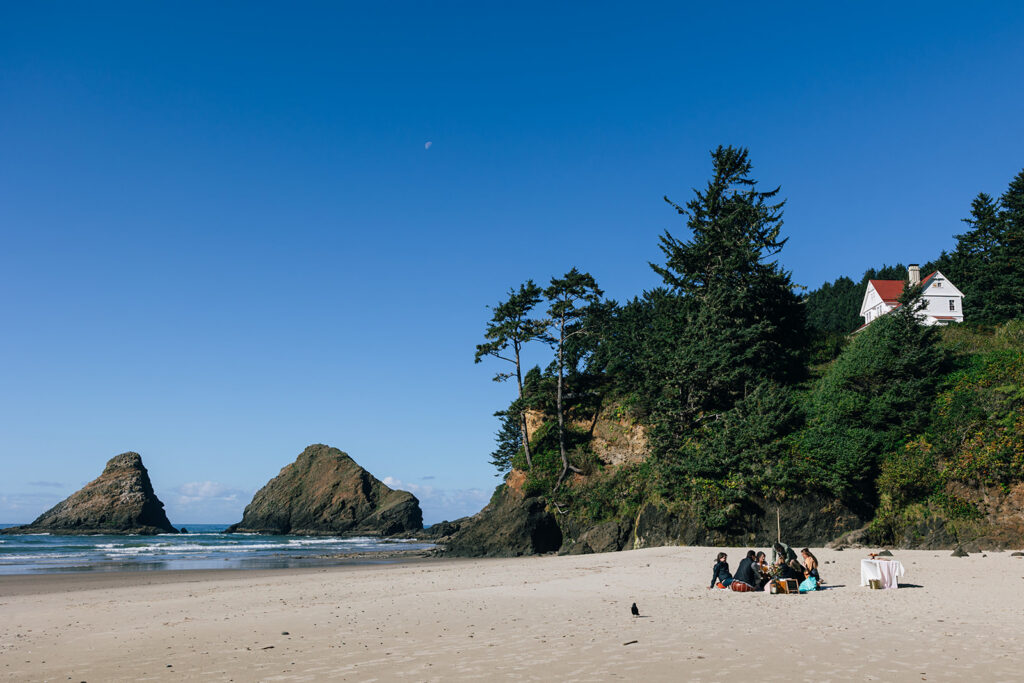Luxury picnic on the beach during an intimate elopement on the Oregon Coast.