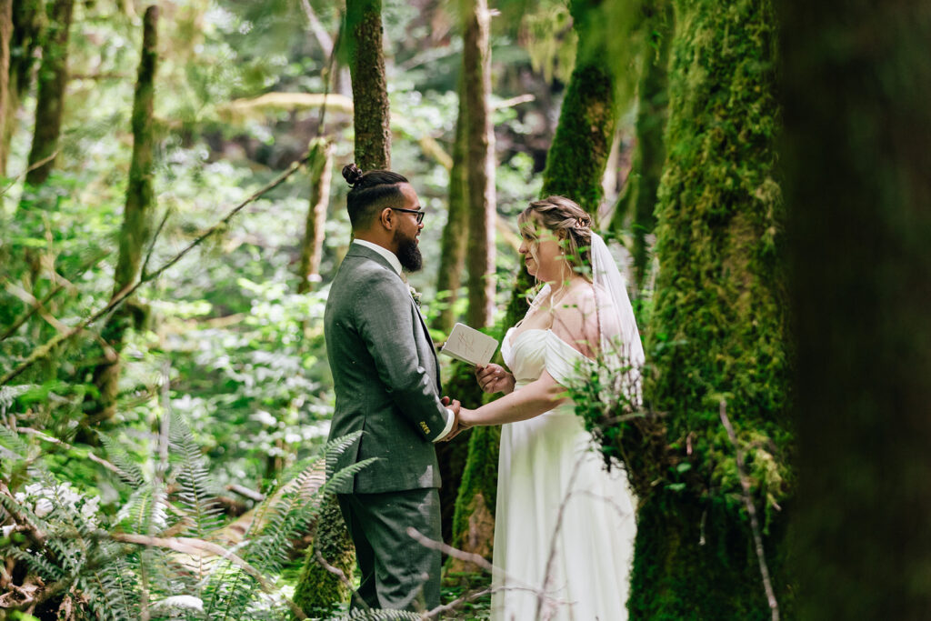 Private wedding vows in the forest in Oregon.