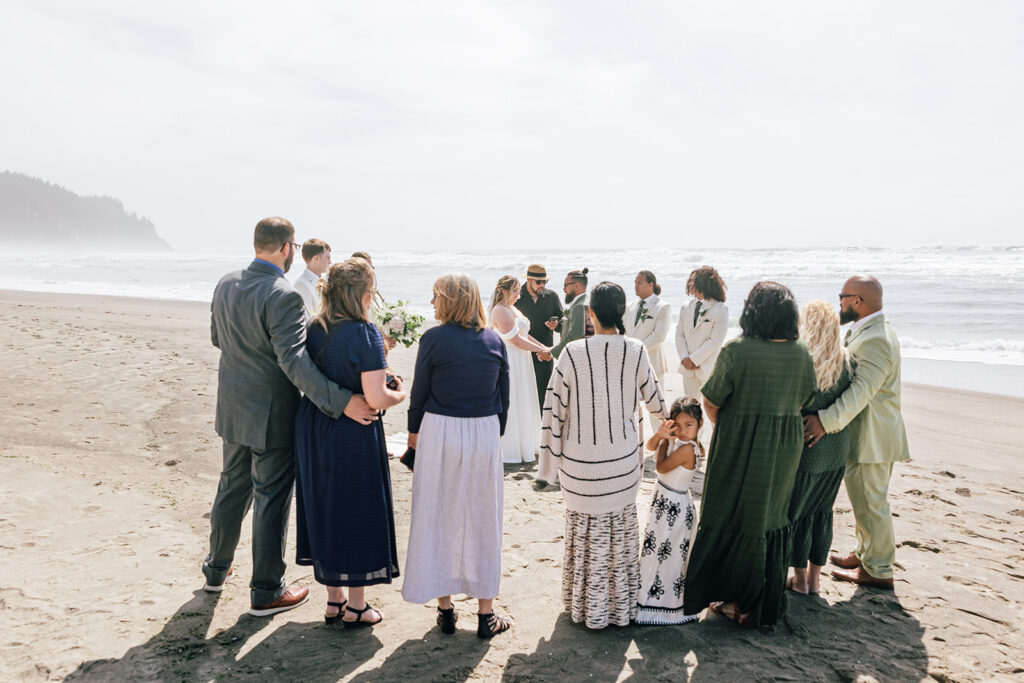 Intimate beach wedding with family on the Oregon Coast. 