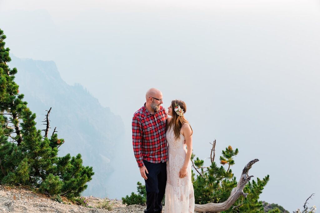 Newly weds being all cute and cuddly for their Crater Park Elopement with beautiful foggy backdrop