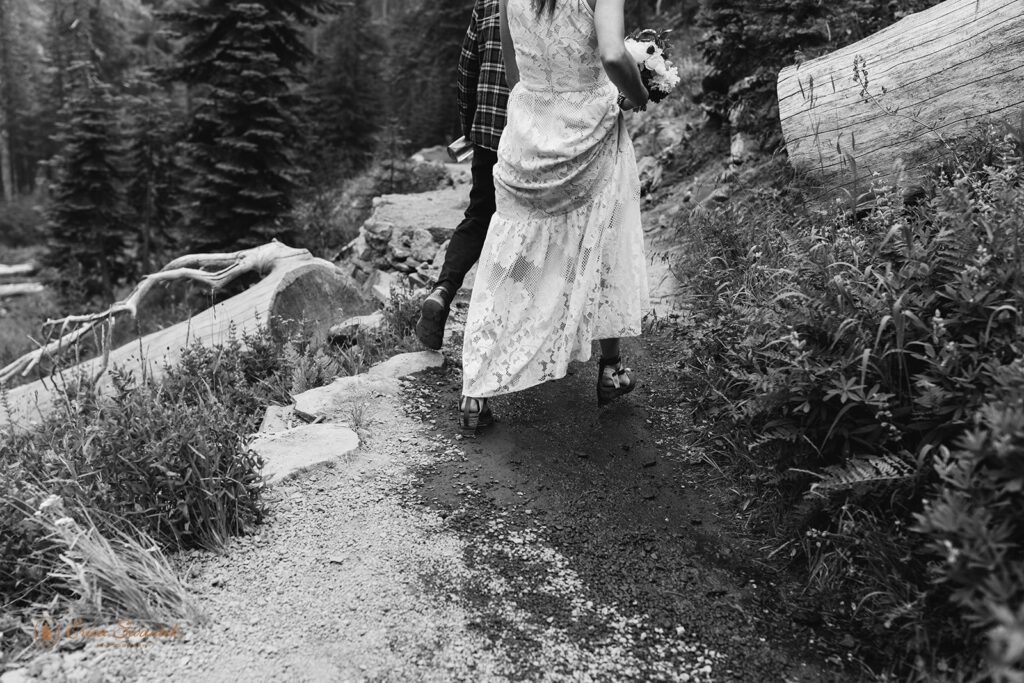 bride and groom going on a hike