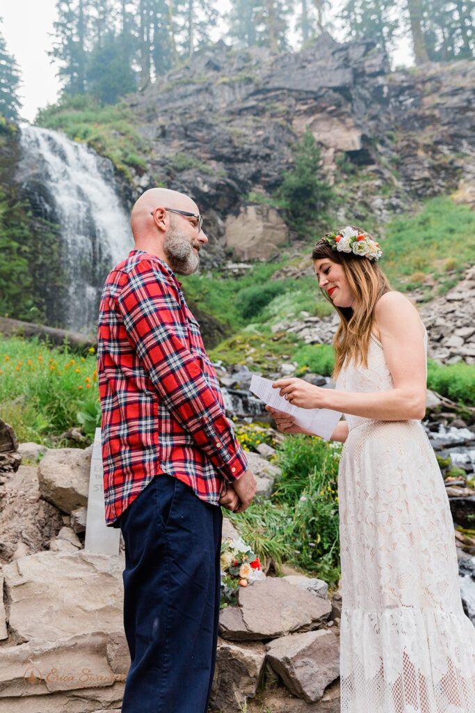 intimate elopement ceremony in Crater Lake with beautiful waterfall backdrops