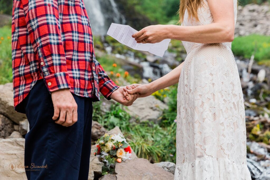 intimate elopement ceremony in Crater Lake with beautiful waterfall backdrops