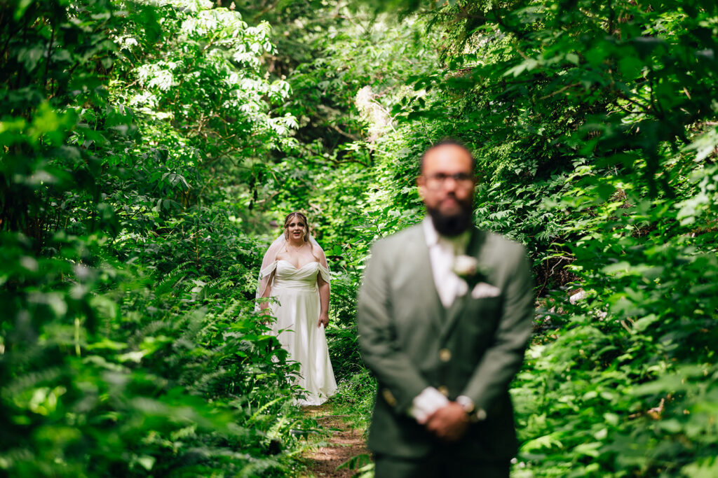 groom seeing his bride for their first look on their elopement day in Oregon