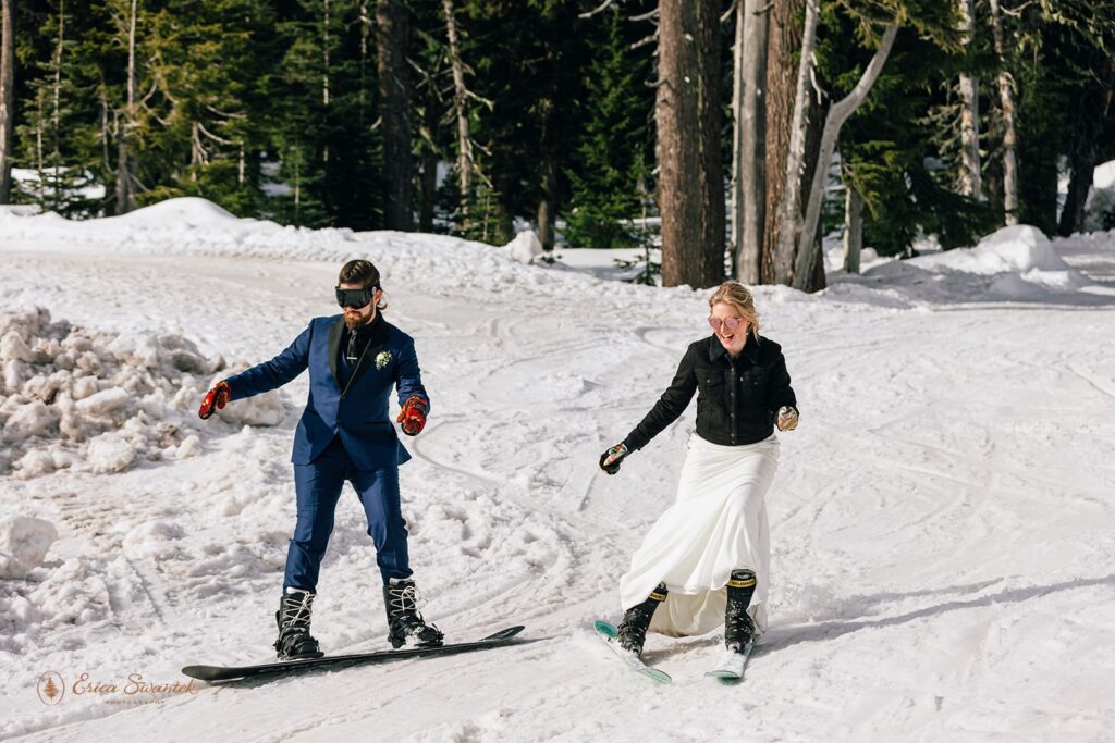 elopement couple shredding the mountain in their elopement attire