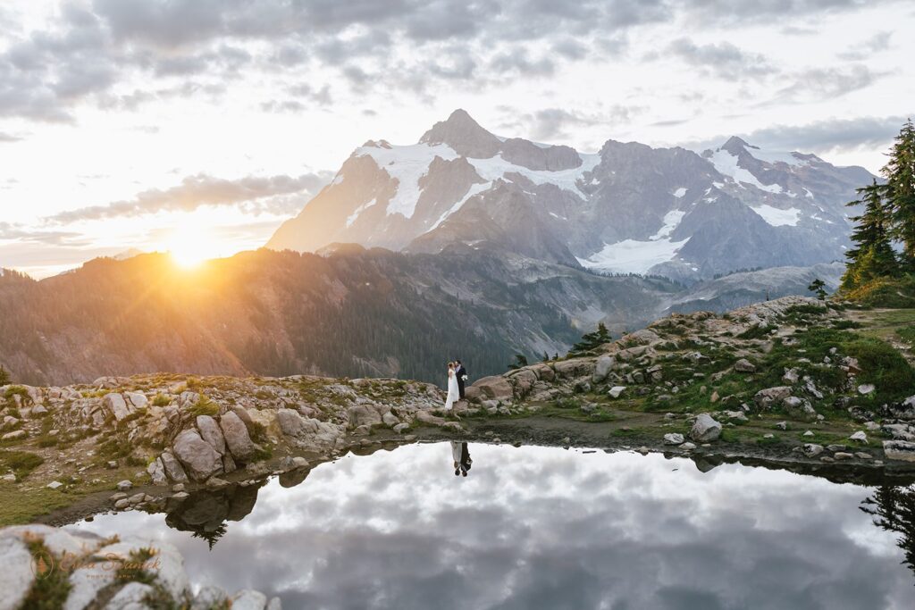 a dreamy PNW elopement at an alpine lake with mountain backdrops