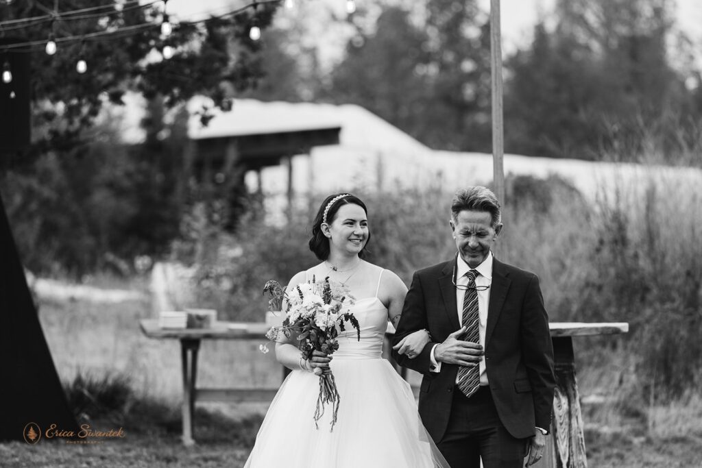 dad walking bride down the aisle at Rainshadow Organics Farm