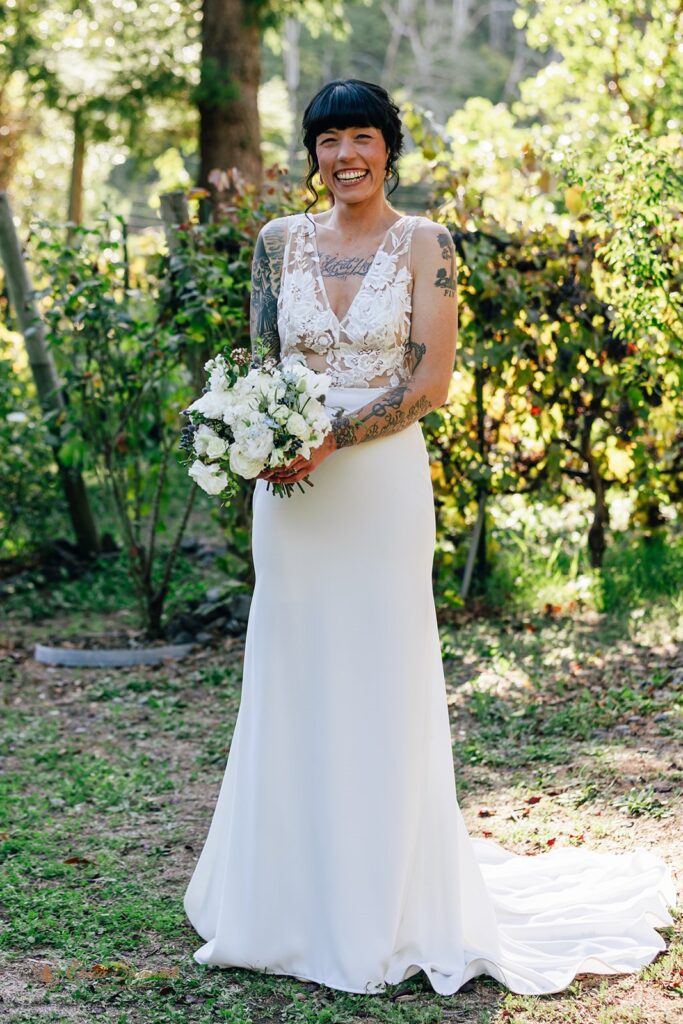 bride beaming with joy during her chetco river elopement day