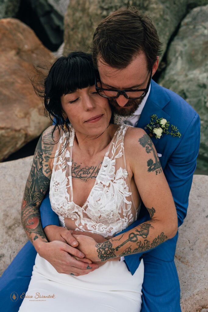 intimate moment of bride and groom hugging