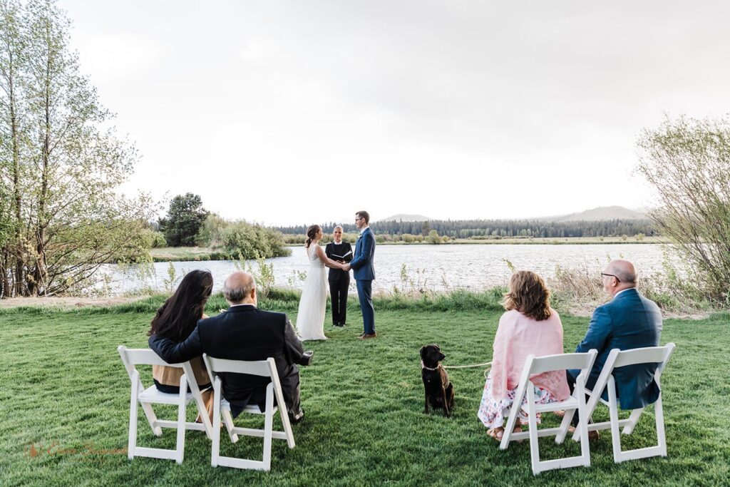 elopement wedding ceremony with parents and couple's dog as witnesses