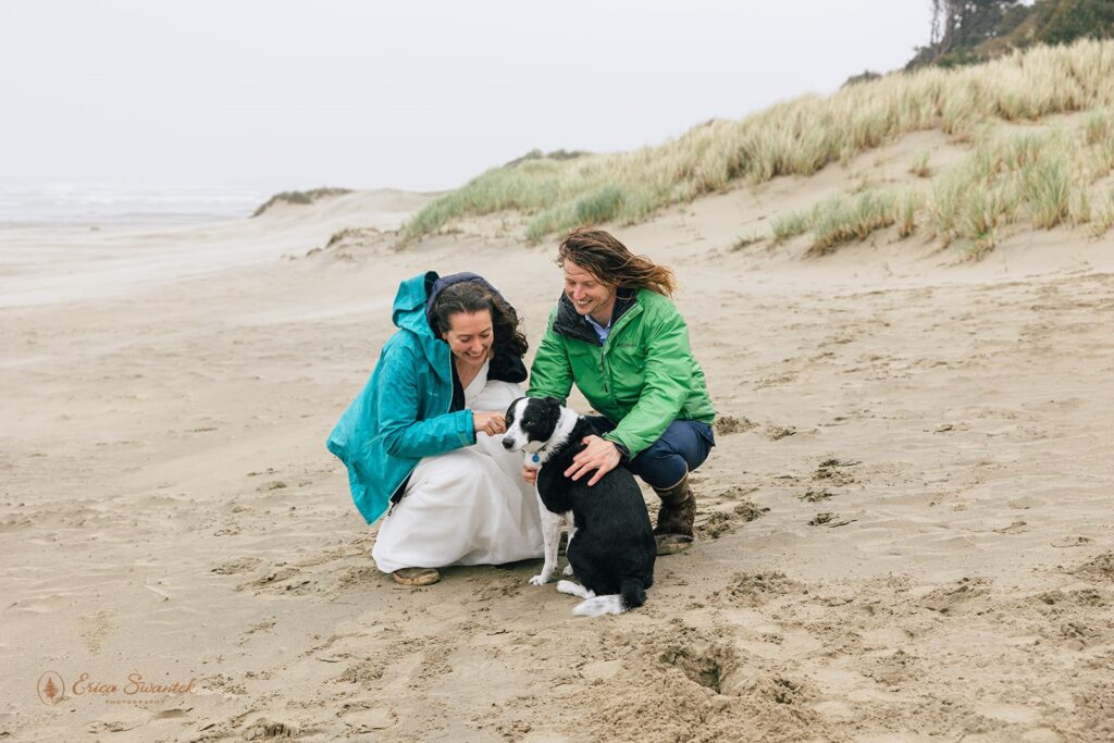 elopement couple cuddling their dog during their dog friendly wedding elopement in PNW