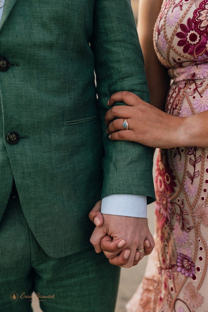 bride and groom holding hands