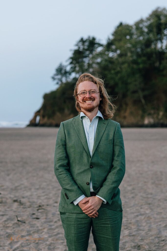 groom in green suit