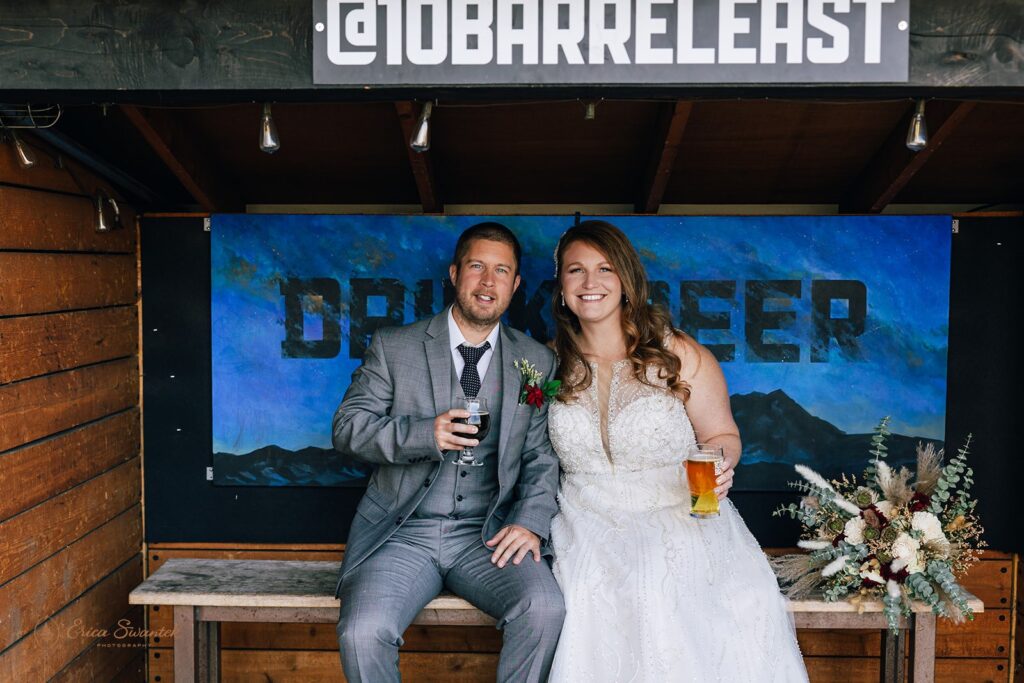 bride and groom photos at a brewery during their bend elopement day