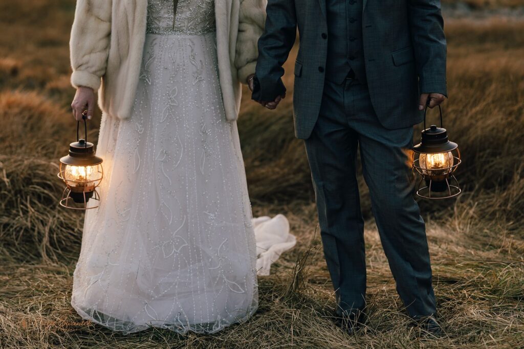 bride and groom evening photos with lanterns with stunning bend, or, landscapes in the backdrop