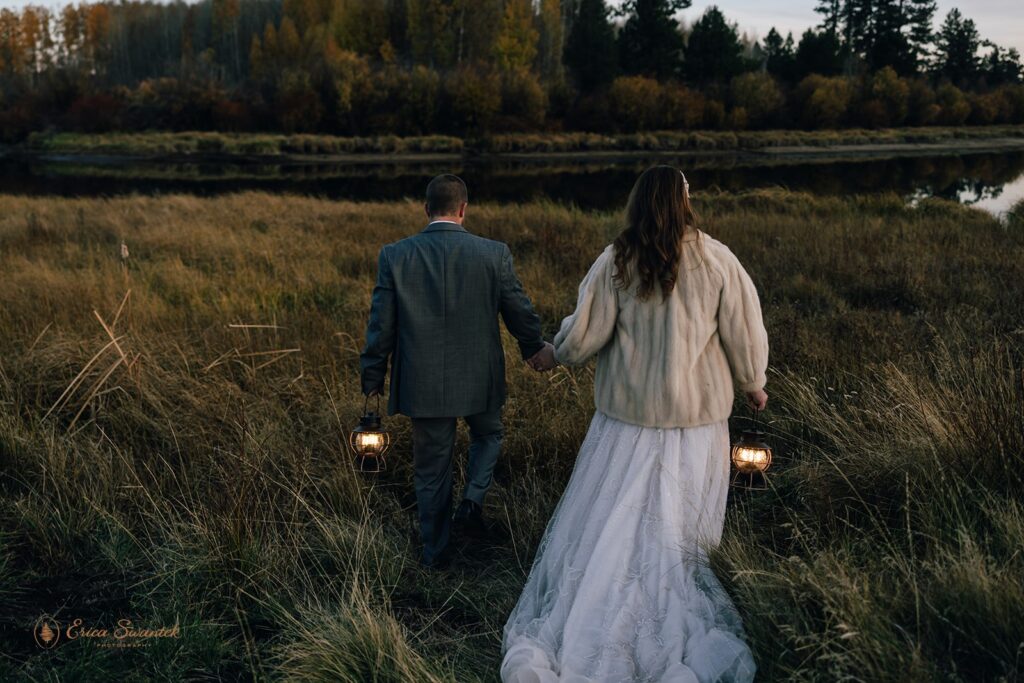 bride and groom evening photos with lanterns with stunning bend, or, landscapes in the backdrop