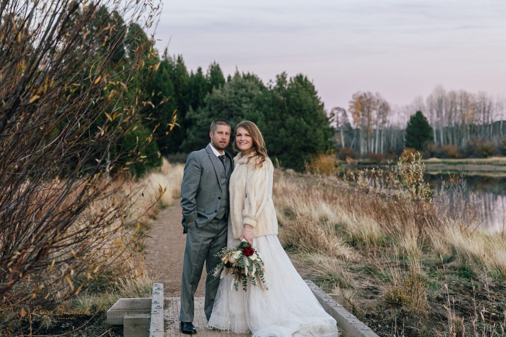 bride and groom surrounded by fall landscapes during their elopement day