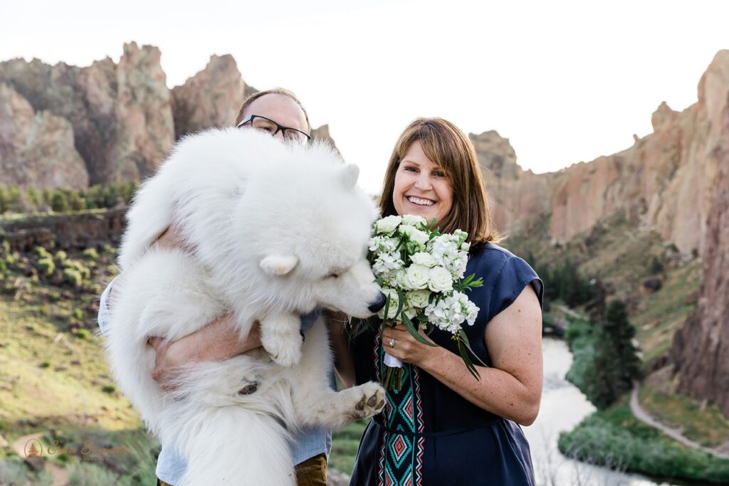 sweet elopement couple with their large white dog