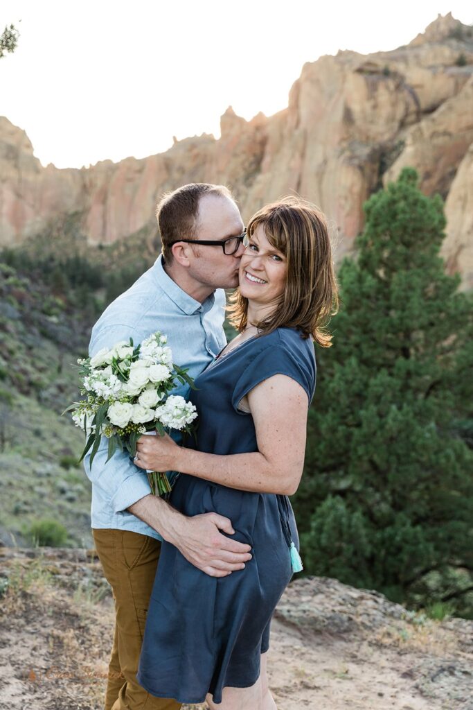 elopement couple kissing during their smith rock elopement day