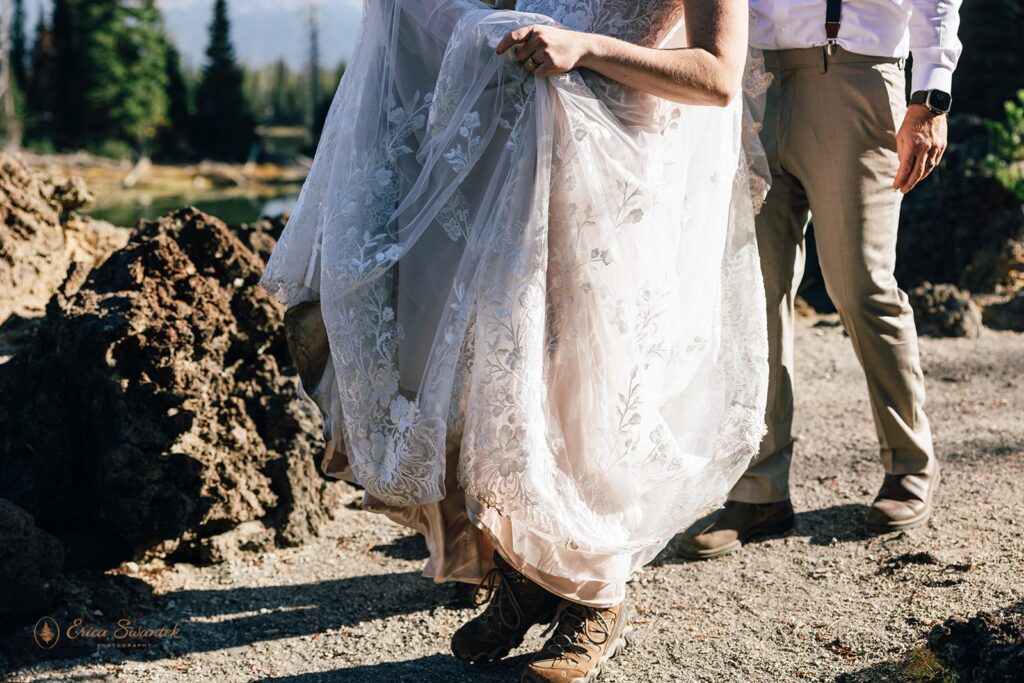 close up of bride and groom hiking