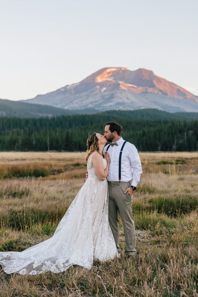 dreamy elopement couple with mountain and forest backdrops during their sparks lake elopement day