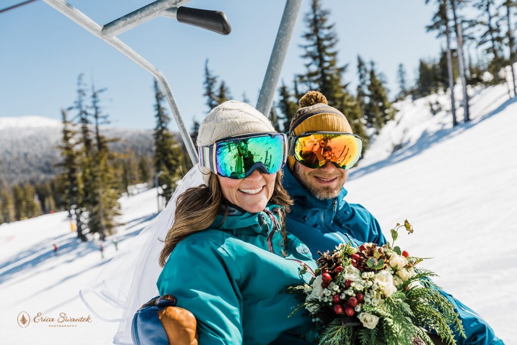 bride and groom on a ski lift