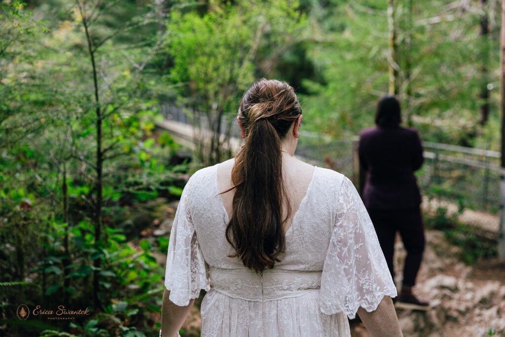 elopement couple first look surrounded by lush forests