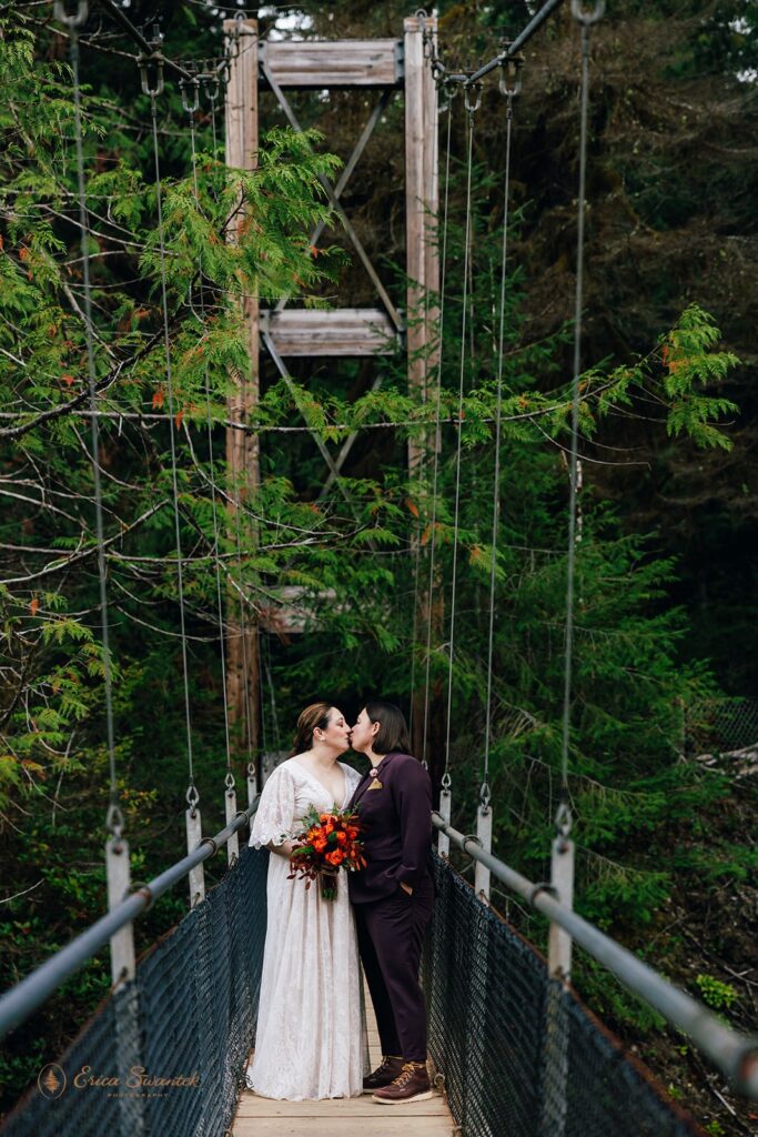 lgbtq hiking elopement photos on the suspension bridge at drift creek falls