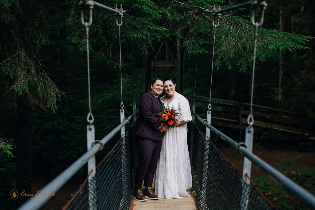 lgbtq hiking elopement on the suspension bridge at drift creek falls