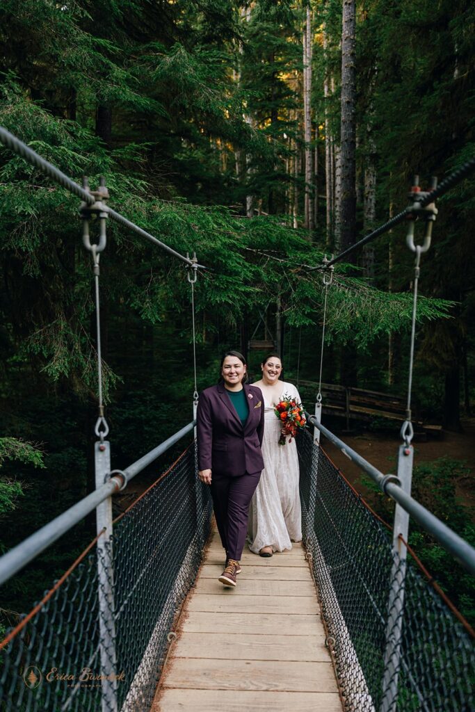 lgbtq hiking elopement photos on the suspension bridge at drift creek falls