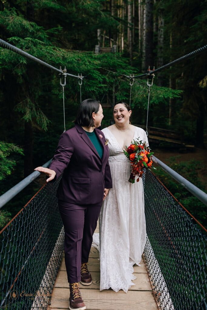 lgbtq hiking elopement photos on the suspension bridge at drift creek falls