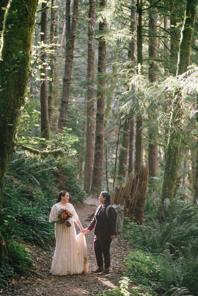 elopement couple surrounded by lush forest